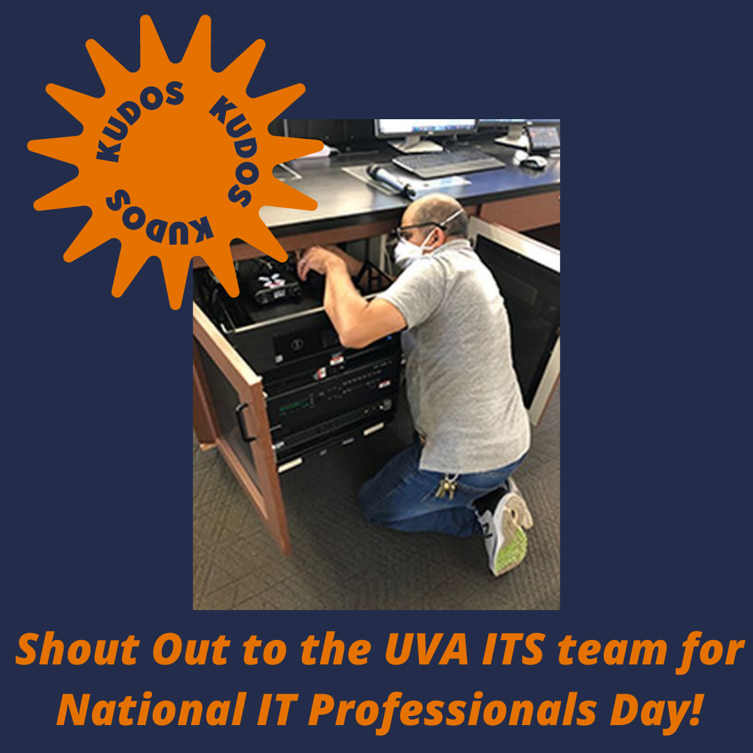 ITS staff member working on computer equipment in a classroom. Kudos. SHout out to the UVA ITS team for National IT Professionals Day!