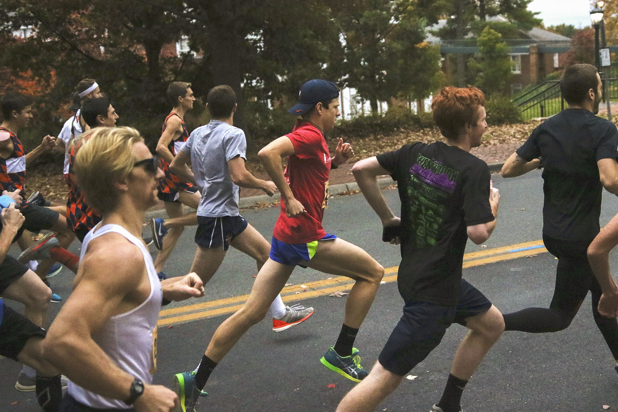 students running the 4th Year 5K on the morning of the last home football game