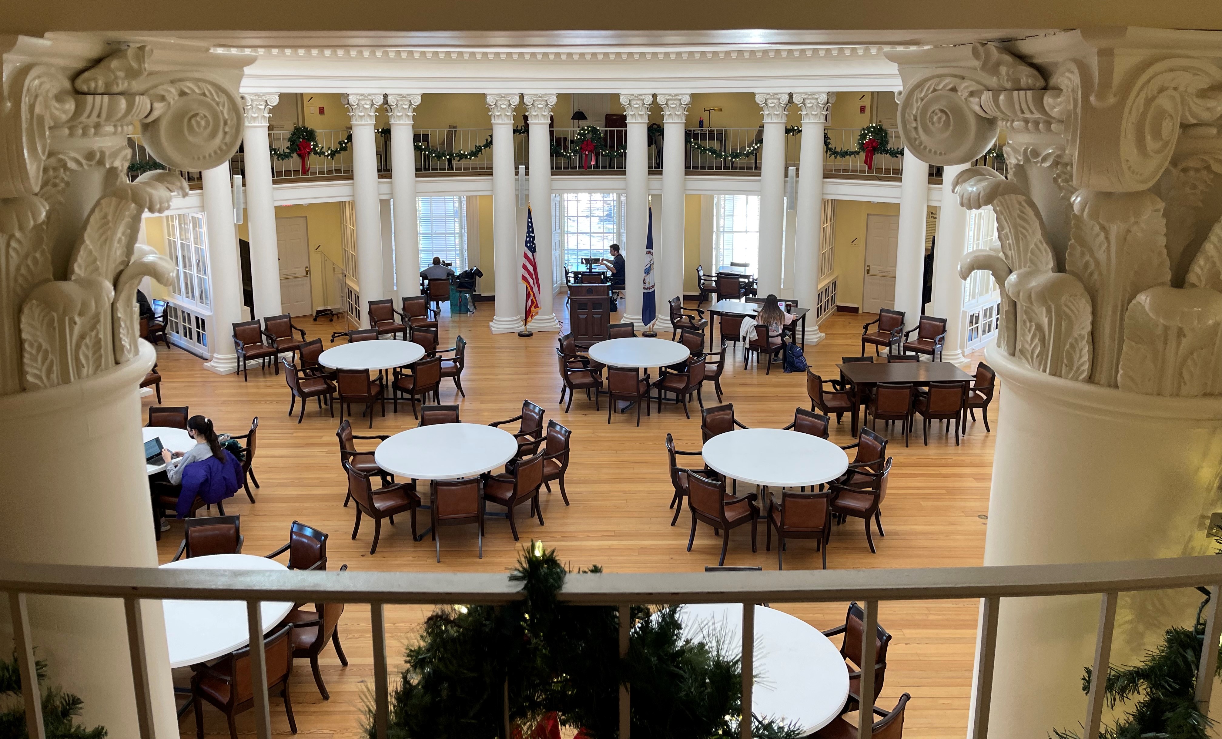 students studying for exams in the Dome Room, decorated for the holidays