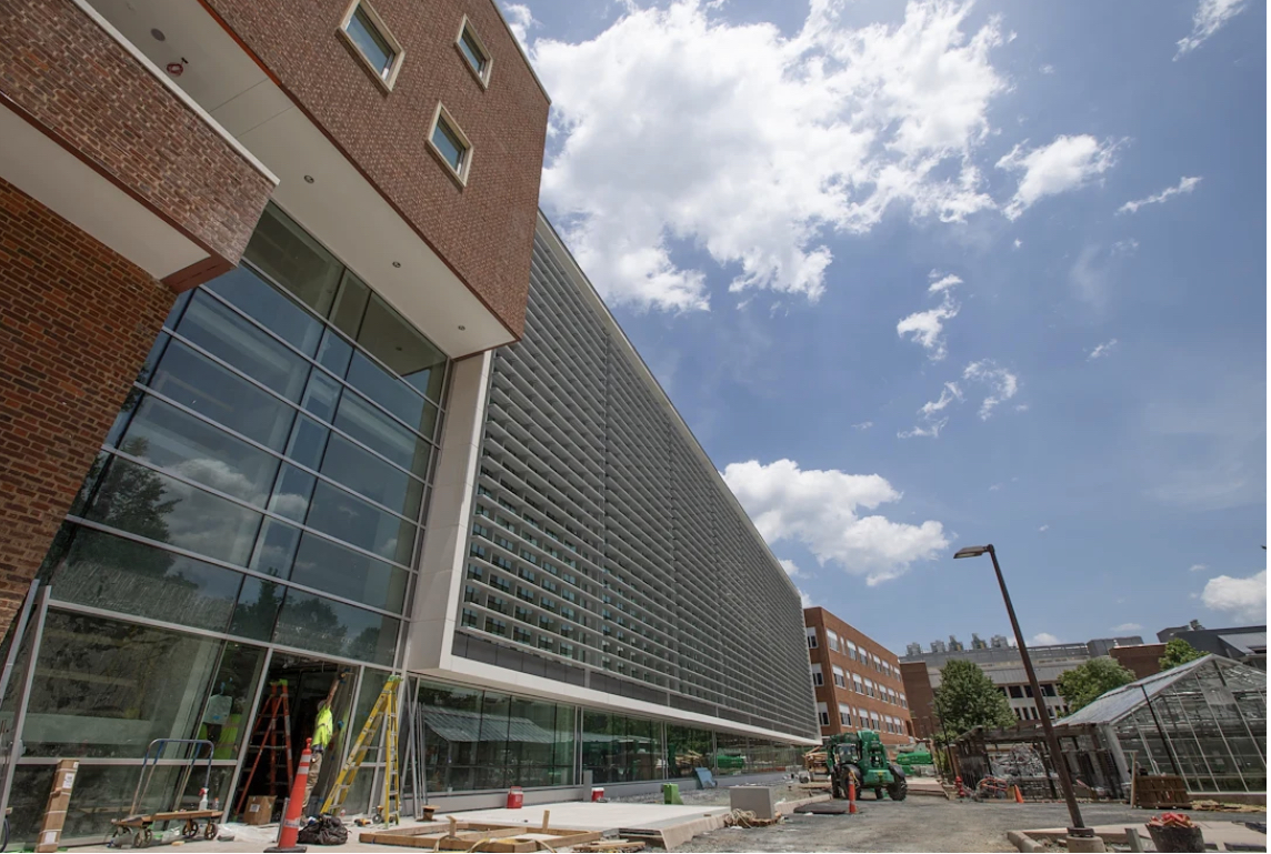 Gilmer Hall's new south facade with a glazed curtain wall and aluminum screen for solar shading