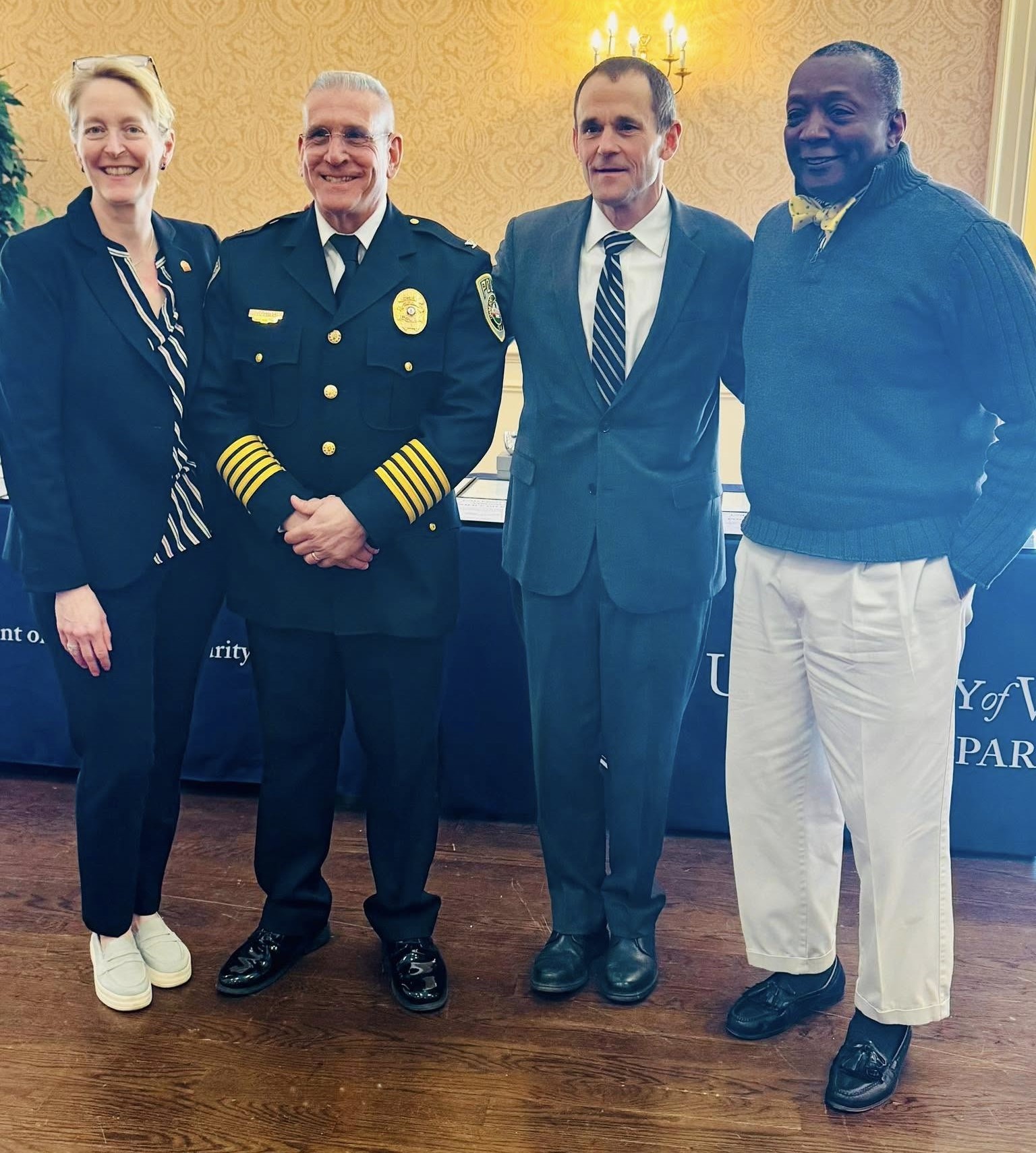JJ standing w/UVA Chief Tim Longo, UVA Pres. Jim Ryan, & Special Advisor to the Vice President of Student Affairs Cedric Rucker