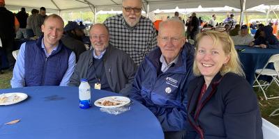JJ seated w/FM leadership & staff at Employee Appreciation Picnic