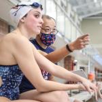 UVA math Professor Ken Ono works with swimmer and Olympic medialist Emma Weyant